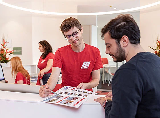 Who can advise me about the German course in Berlin?